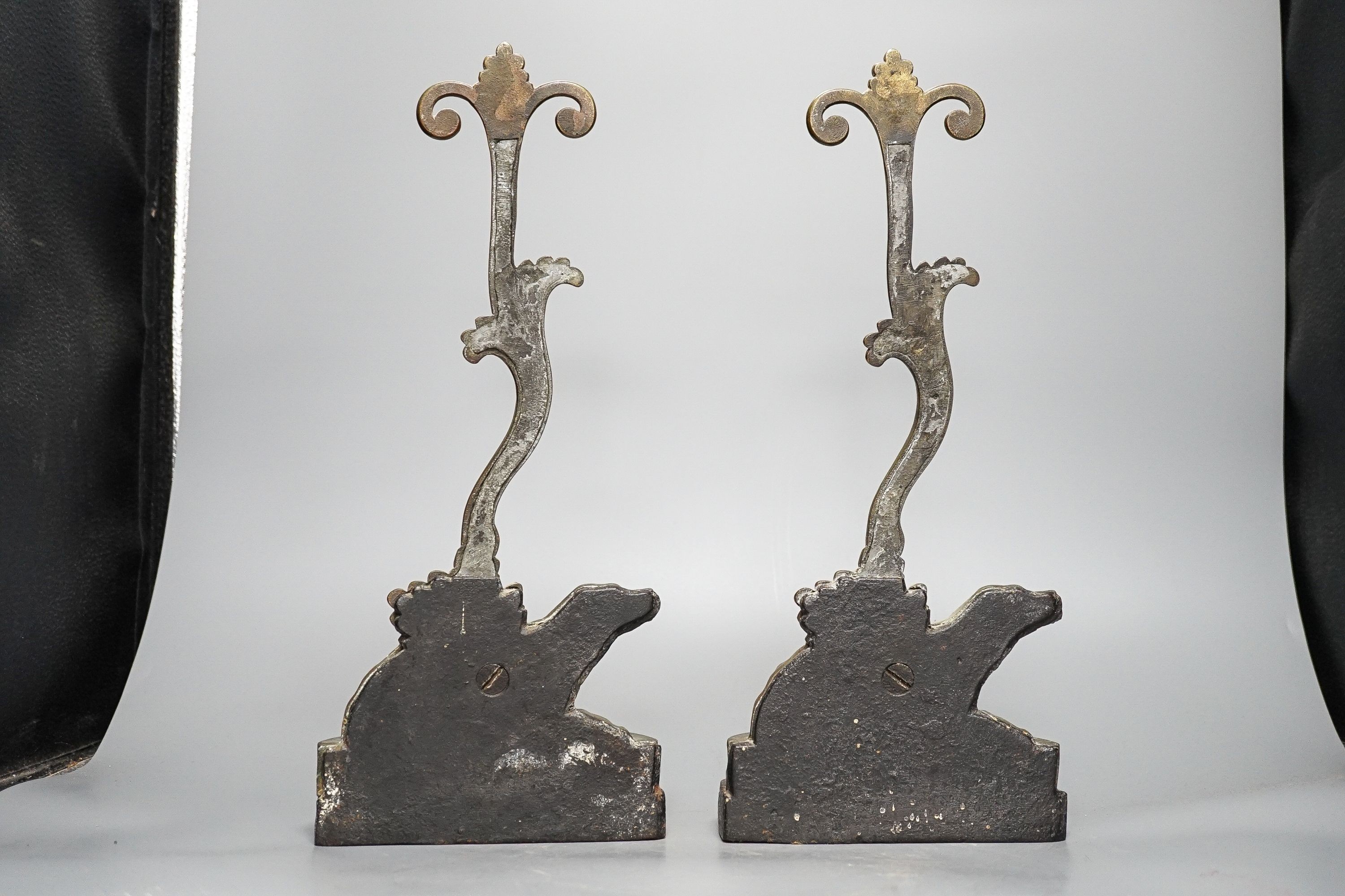 Two matching Victorian cast brass ‘spaniel’ door stops.